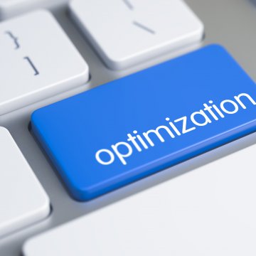 blue optimization key on white computer keyboard system optimizers